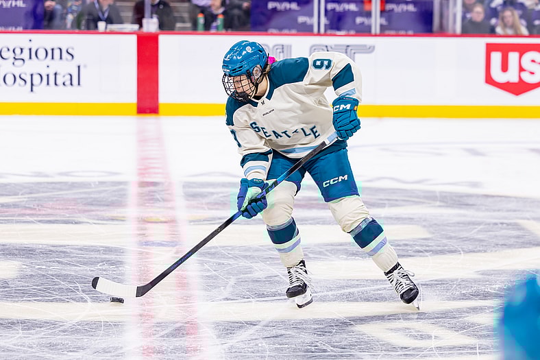 Seattle Torrent forward Jessie Eldridge carries the puck.
