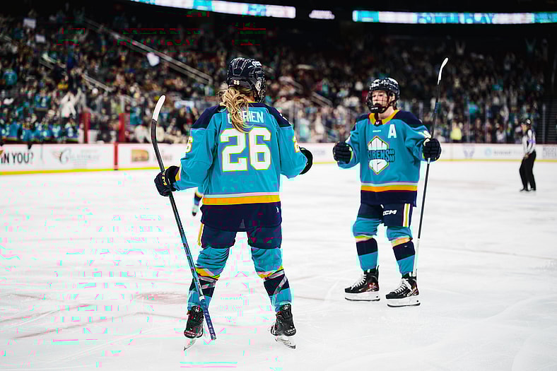 New York Sirens rookie Casey O'Brien celebrates with Sarah Fillier after a power-play goal.