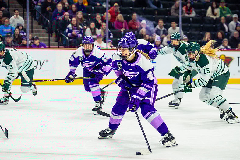 Minnesota Frost forward Denisa Křížová shoots the puck against the Boston Fleet.