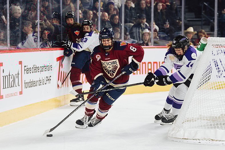 Montreal Victoire forward Gabrielle David controls the puck against the Minnesota Frost.