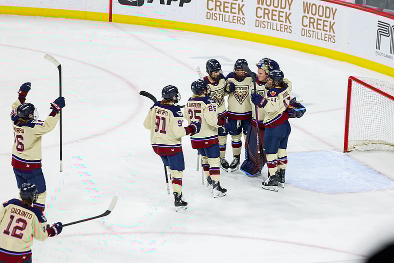 The Montreal Victoire celebrate after goalie Ann-Renée Desbiens shut out the Minnesota Wild in a 3-0 win.