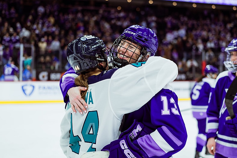New York Sirens forward Denisa Křížová hugs former teammate, Minnesota Frost forward Grace Zumwinkle.