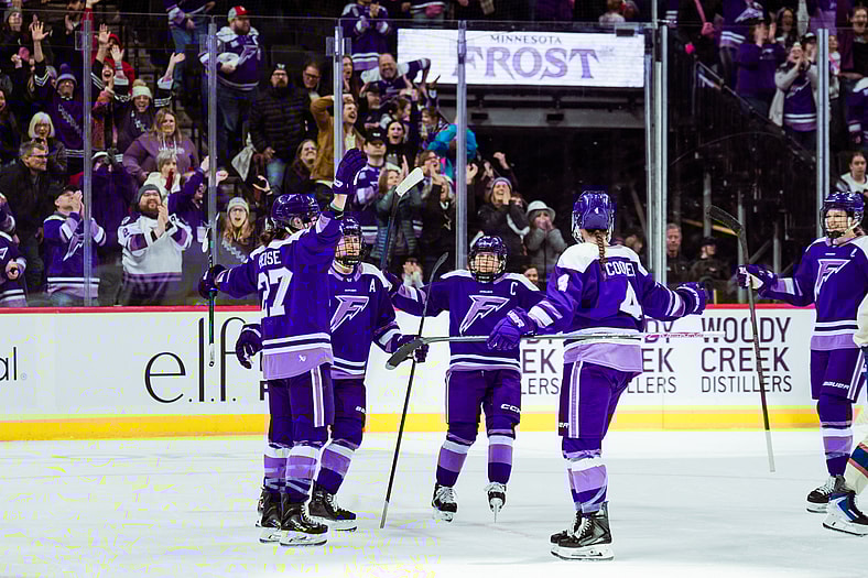 Minnesota Frost captain Kelly Pannek celebrates with teammates during a 6-5 win over the Vancouver Goldeneyes.