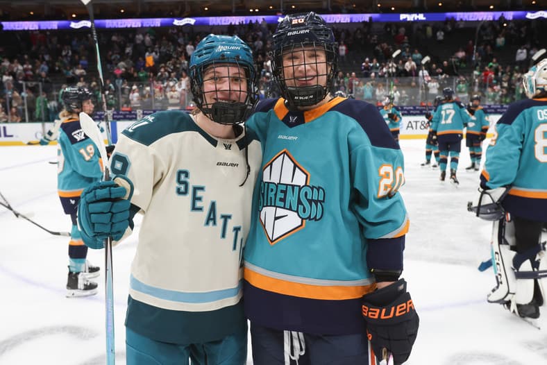 New York Sirens defender Allyson Simpson and Seattle Torrent forward Hannah Bilka at the PWHL's Takeover Tour matchup in Dallas, TX.