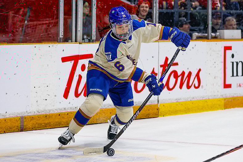 Vancouver Goldeneyes defender Sophie Jaques handles the puck.