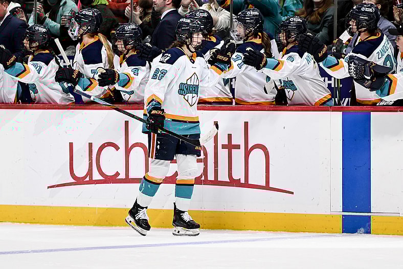 New York Sirens rookie Anna Bargman high-fives teammates after a power-play goal against the Minnesota Frost in the third period.