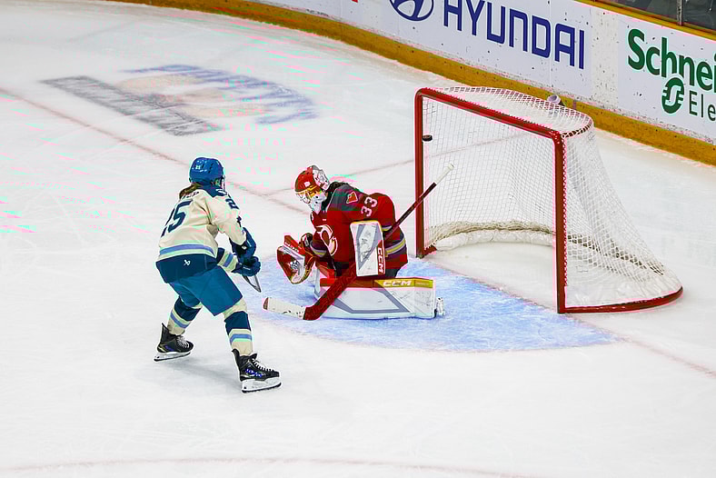 Seattle Torrent forward Alex Carpenter scores the first penalty shot goal in PWHL history against Ottawa Charge goalie Gwyneth Philips.