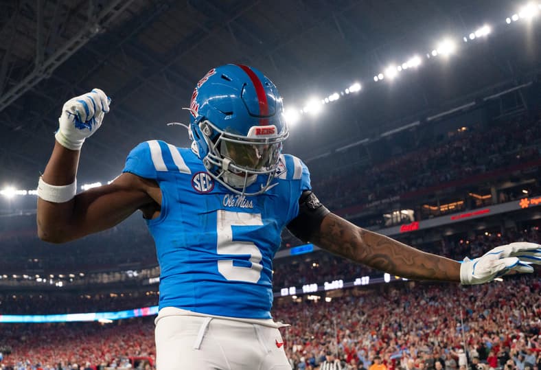 Ole Miss running back Kewan Lacy (5) celebrates after scoreing a touchdown during the CFP Fiesta Bowl against Miami at the State