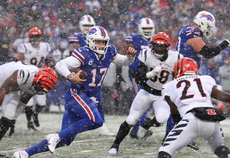 Bills quarterback Josh Allen carries the ball before being tackled. The play was later called off with the Bills receiving a