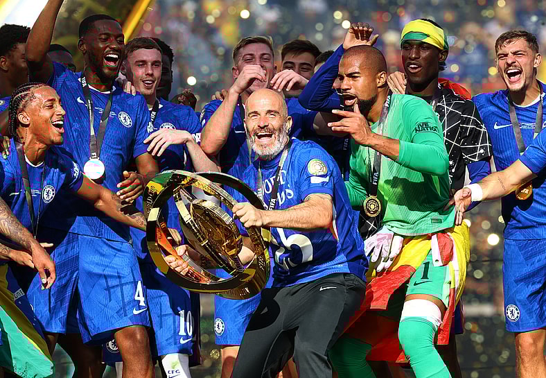 Enzo Maresca lifting FIFA Club World Cup Trophy With Chelsea