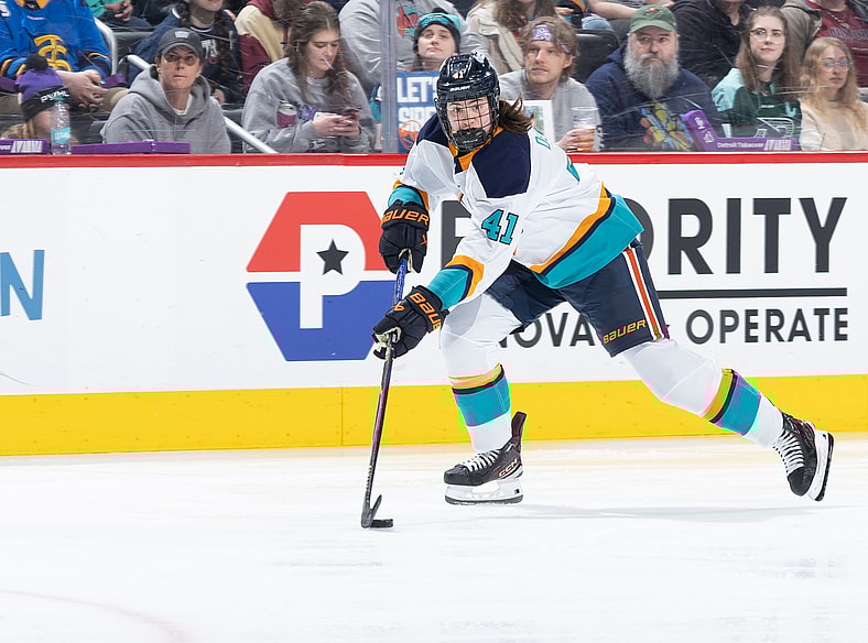 New York Sirens forward Clair DeGeorge carries the puck against the Montreal Victoire.