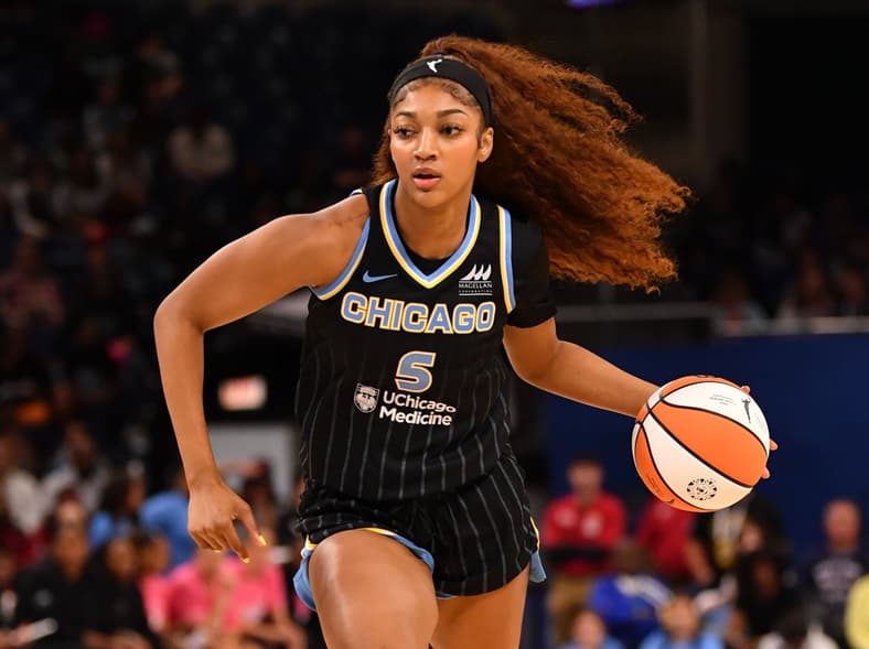 Chicago Sky forward Angel Reese (5) drives towards the basket during the first half against the Dallas Wings at the Wintrust Arena.