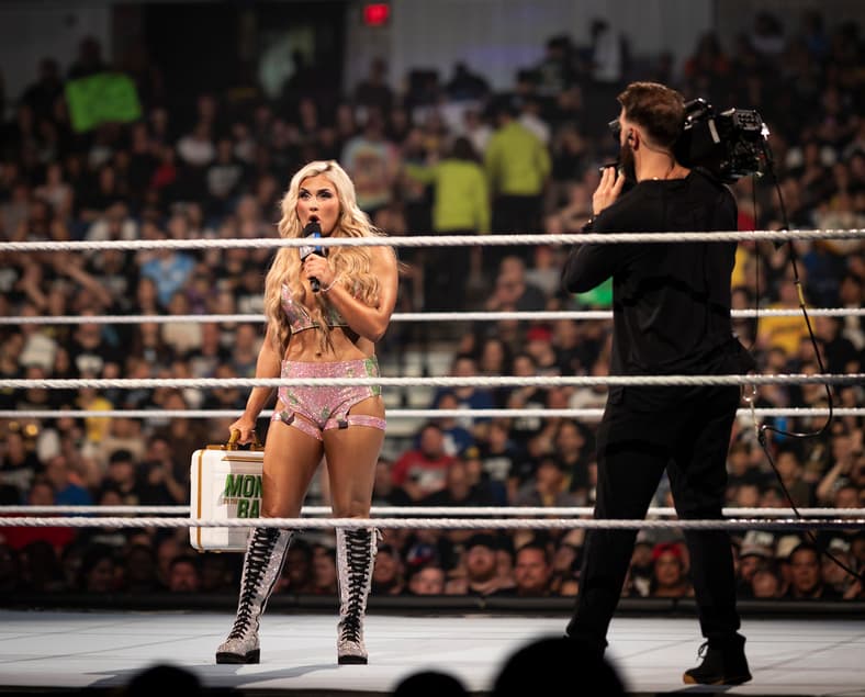 WomenÕs MITB winner, Tiffany Stratton talks to the fans during ÒTiffy TimeÓ on SMACKDOWN!.