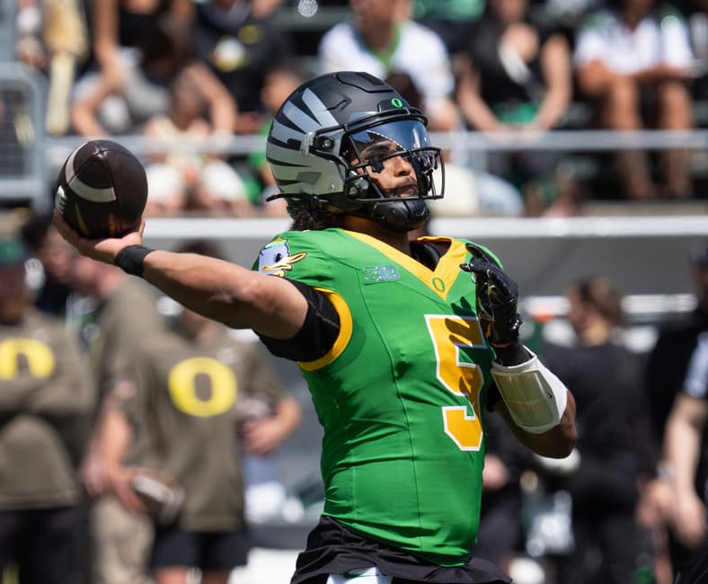 Oregon quarterback Dante Moore throws downfield during the Oregon Spring Game at Autzen Stadium in Eugene April 25, 2026