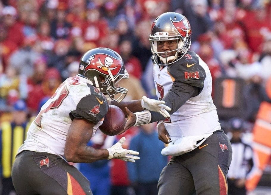 Jameis Winston hands off to Doug Martin