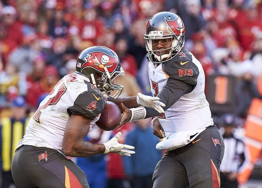 Jameis Winston hands off to Doug Martin